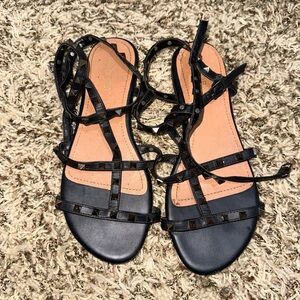 Women spiky sandals, up to the ankle, color is black